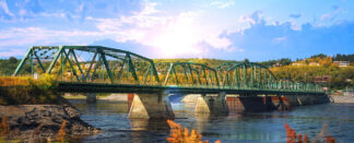 Old Saguenay Bridge and River - Colorful Stock Photos